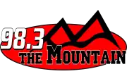 98.3 The Mountain with the shape of mountains in the background