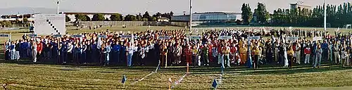 World Games I athletes grouped by sport at the inaugural opening ceremony; tug of war pulling area marked on foreground for first ever World Games event, which followed the ceremony