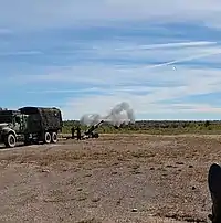 W battery firing LG1 105mm howitzer