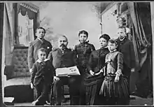 Studio portrait of Richard Bogle and America Waldo Bogle with their children. Photo circa 1875.