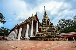 Ubosot (main hall) and chedi (pagoda) of Wat Khanon a local ancient temple