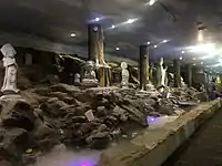 Water feature in the temple, featuring statues of various bodhisattvas