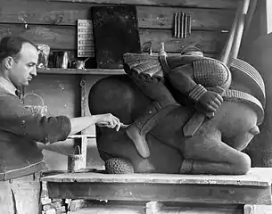 Waylande Gregory working on one of the six ceramic figures comprised in the WPA sculptural fountain, Light Dispelling Darkness (1937), at Roosevelt Park in Edison, New Jersey