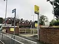 West Didsbury Metrolink stop, on the opposite side of Palatine Road