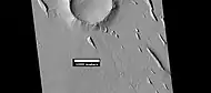 Yardangs near a crater in Amazonis, in the middle of the region