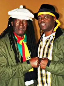 Jarrett (left) with Sugar Minott in 2005