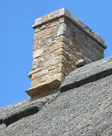 The stones protect the joins of thatched roofs