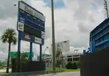 View of outfield wall & scoreboard outside the park