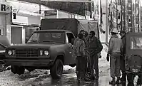 National Guardsmen work with local workers and volunteers in Boston