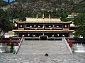 Front view of Gönlung Jampa Ling main temple