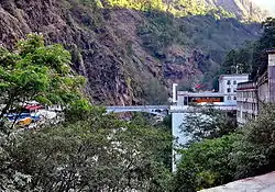 The Tibet-Nepal Bridge below Zhangmu, which is the border crossing between Tibet and Nepal. To the right is the Zhangmu Port Control Point.