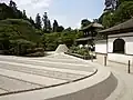 The Zen rock garden of Ginkaku-ji features a miniature mountain shaped like Mount Fuji.