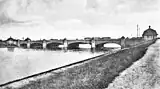 Around 1935 with the bridge houses