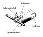 The breech block.